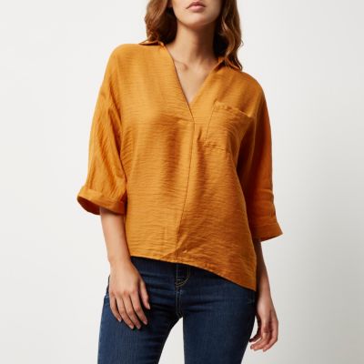 Orange split back blouse